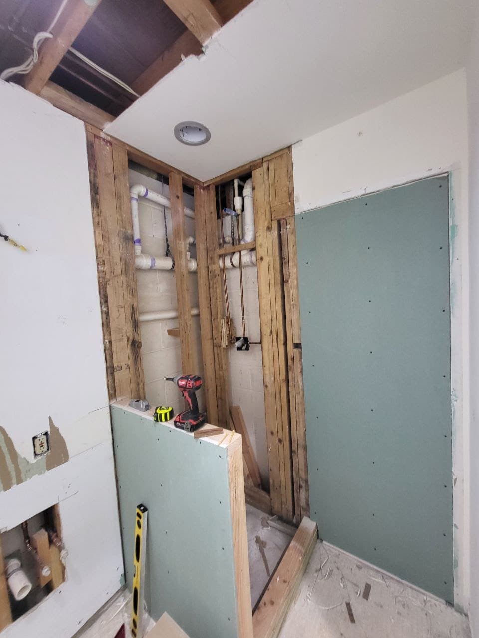 Shower wall framing with PVC drains and cement board