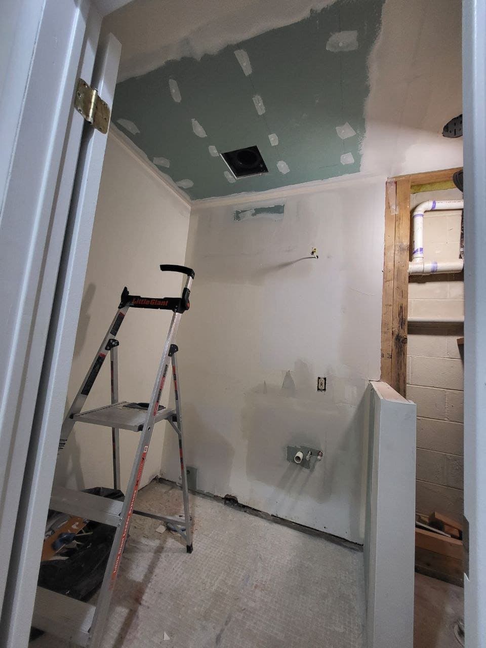 Green board ceiling mudded during a bathroom remodel